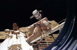 View of Mir-24 Commander Anatoly Solovyev performing an EVA